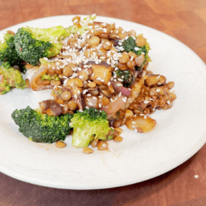 Broccoli and onions on a plate.