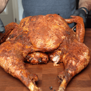 Spatchcock turkey cooked golden brown.