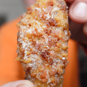 A wing with bacon and parmesan cheese.