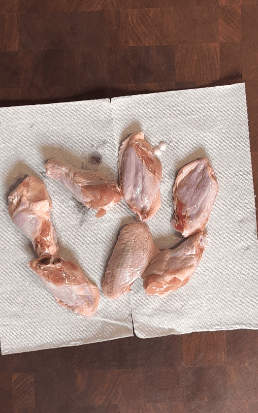 Wings on paper towels.
