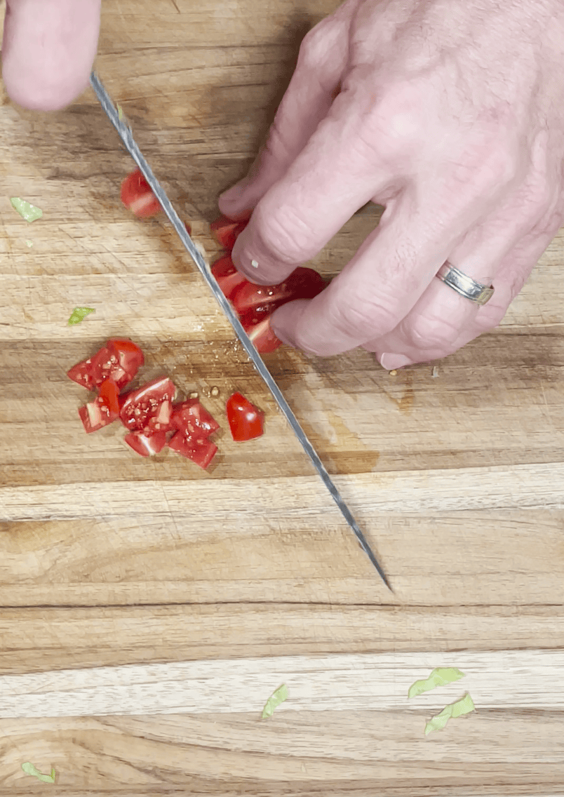 Tomatoes being diced.