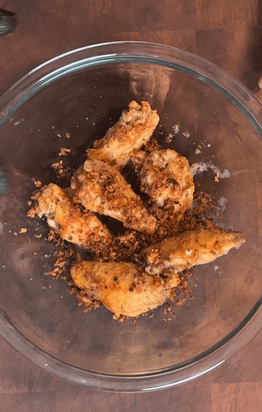 Wings tossed with bacon crumbles.