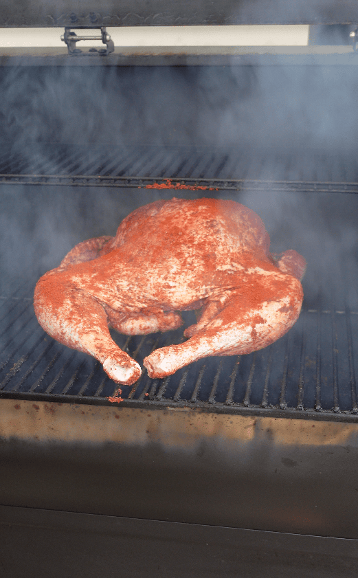A turkey on a smoker.