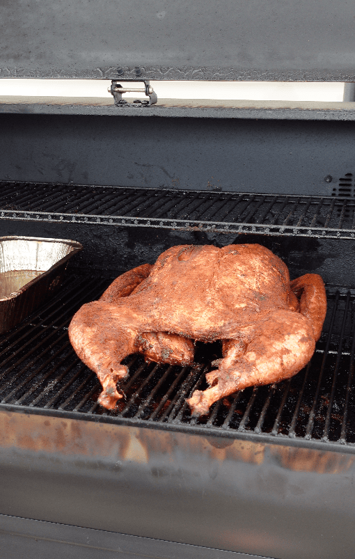 A turkey on a smoker.