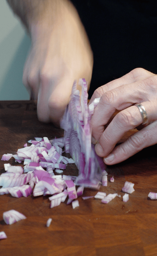 Red onions being diced.