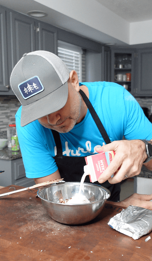 Heavy cream in a mixing bowl.
