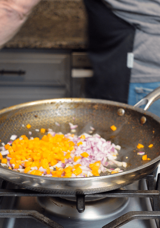 Peppers and onions sautéing.