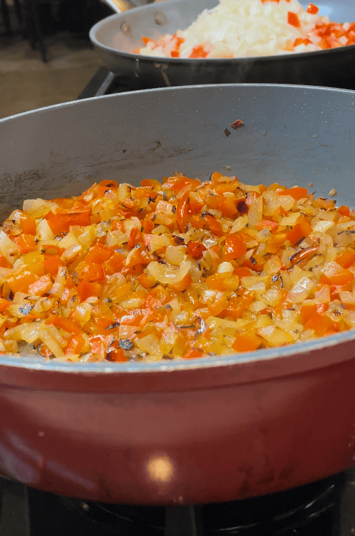 Peppers and Onions in a skillet.
