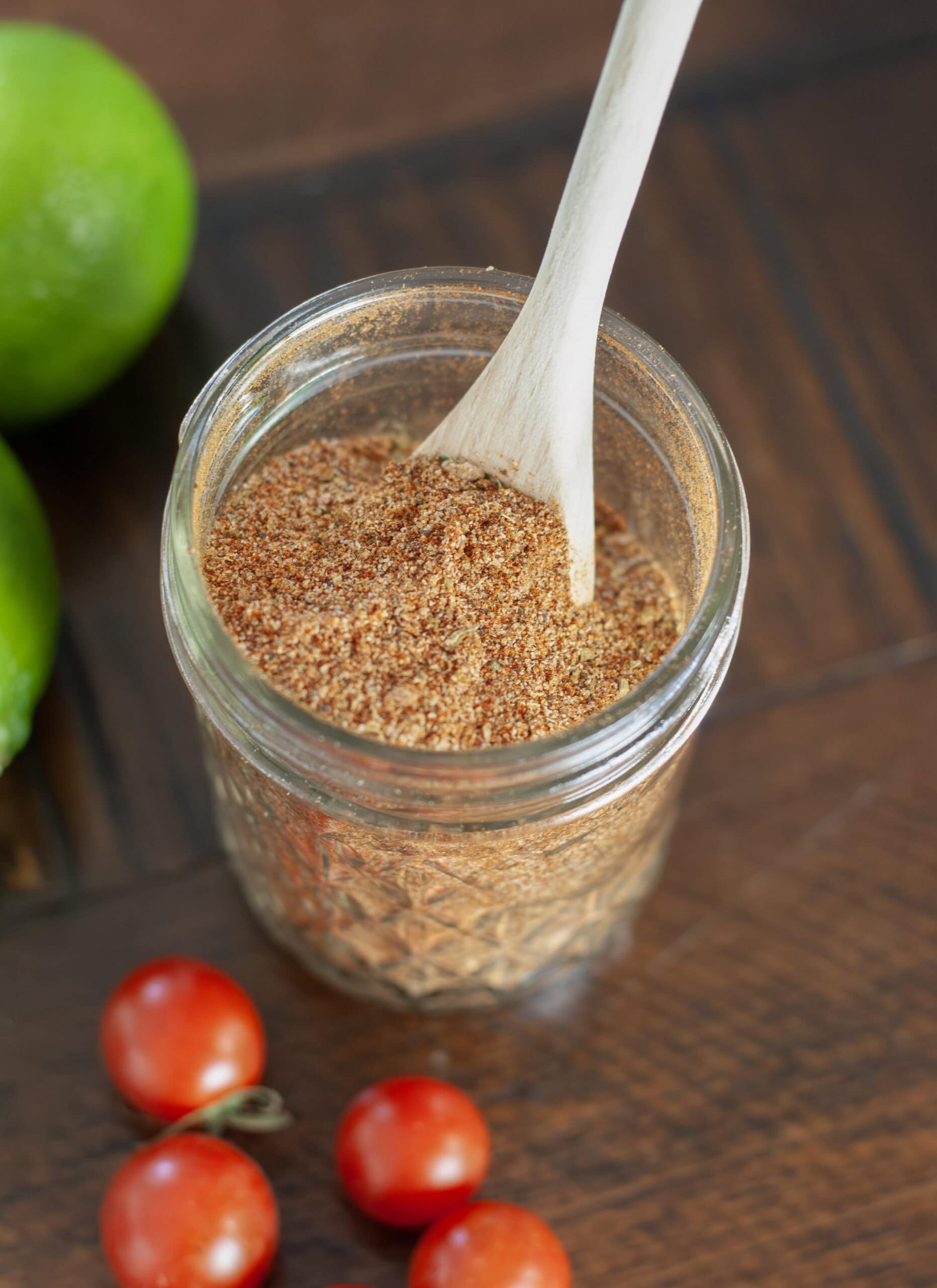 A jar filled with taco seasoning.