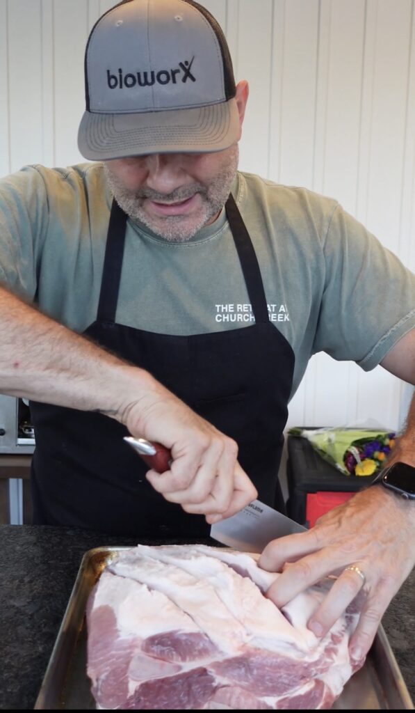 Slicing into pork butt.