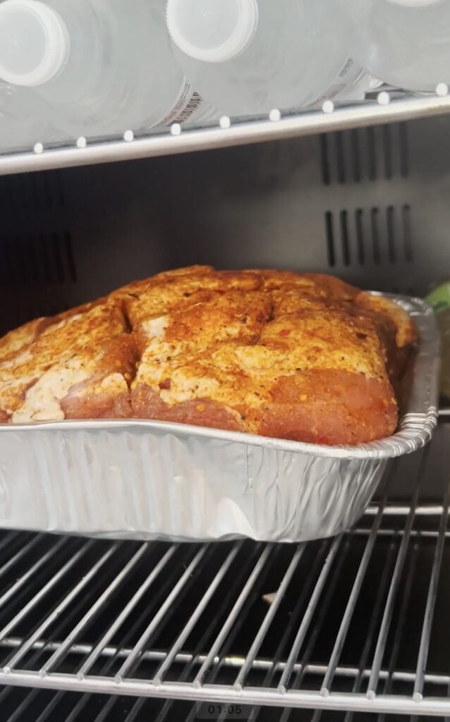 Pork butt in a pan.