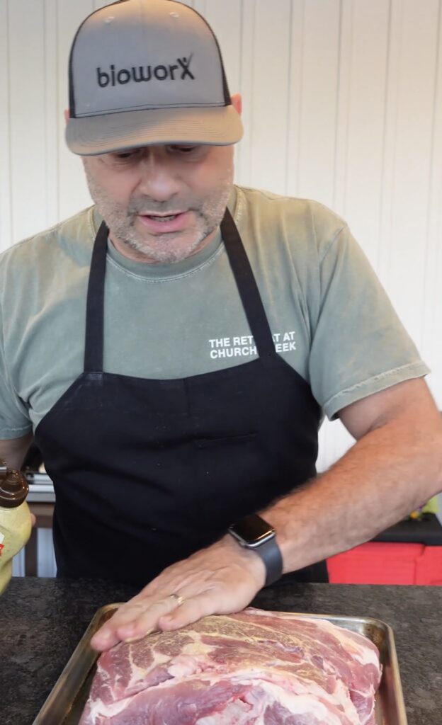 Mustard binder going on pork.