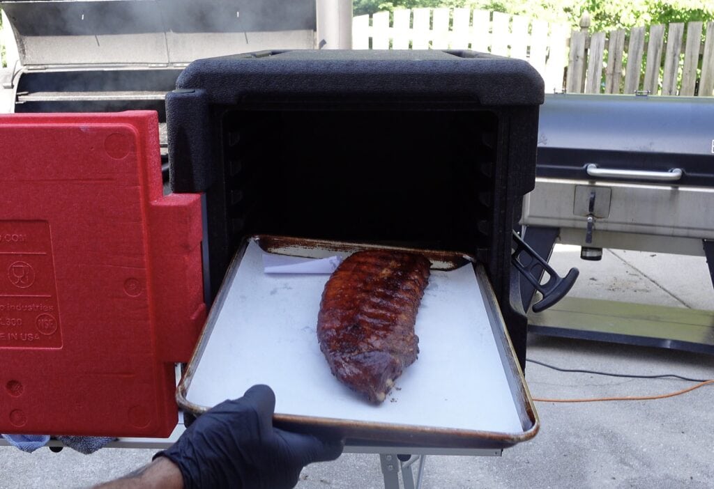 Smoked BBQ Pork Ribs going into a hot box.