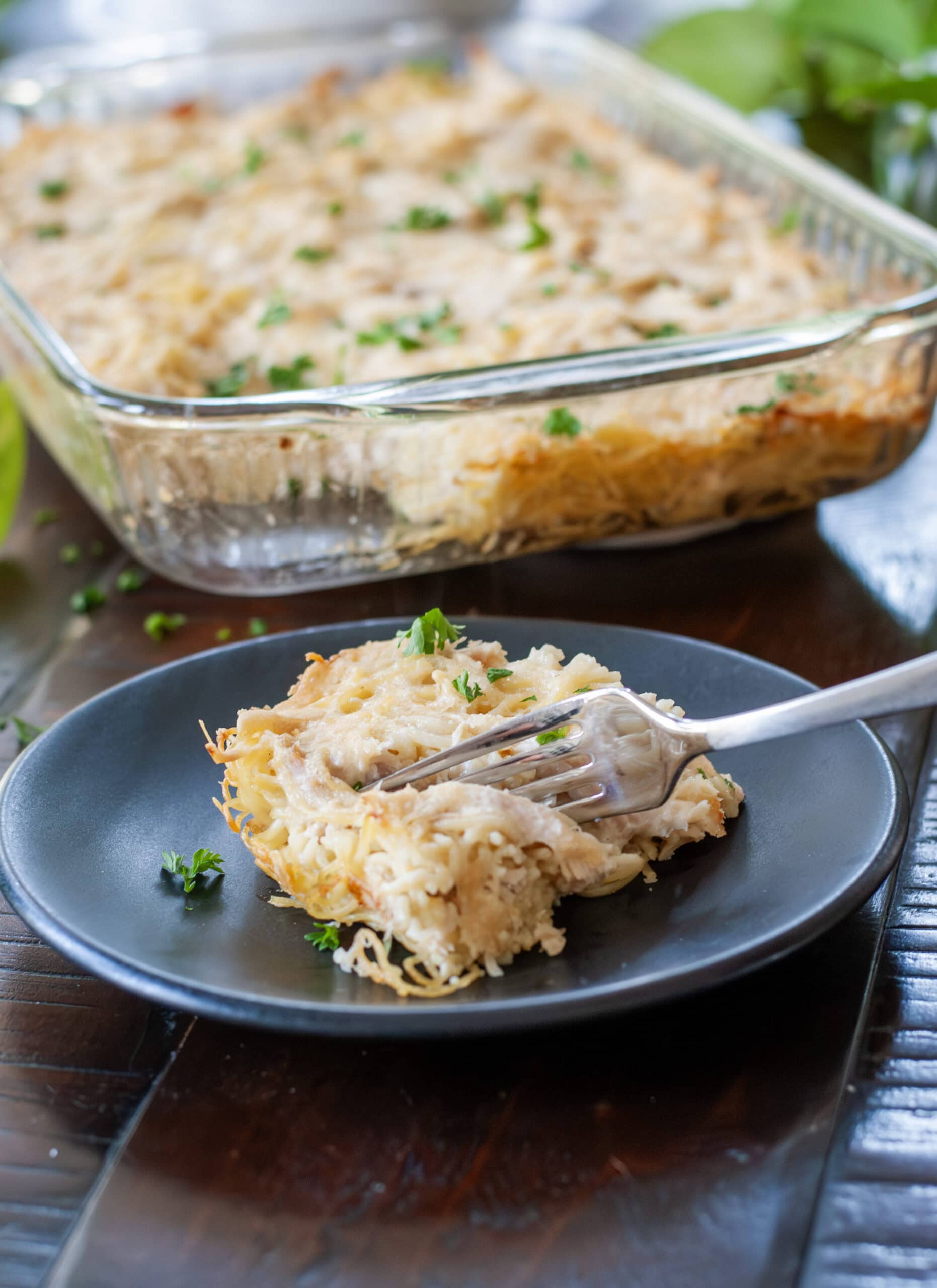 A fork full of creamy chicken tetrazzini.