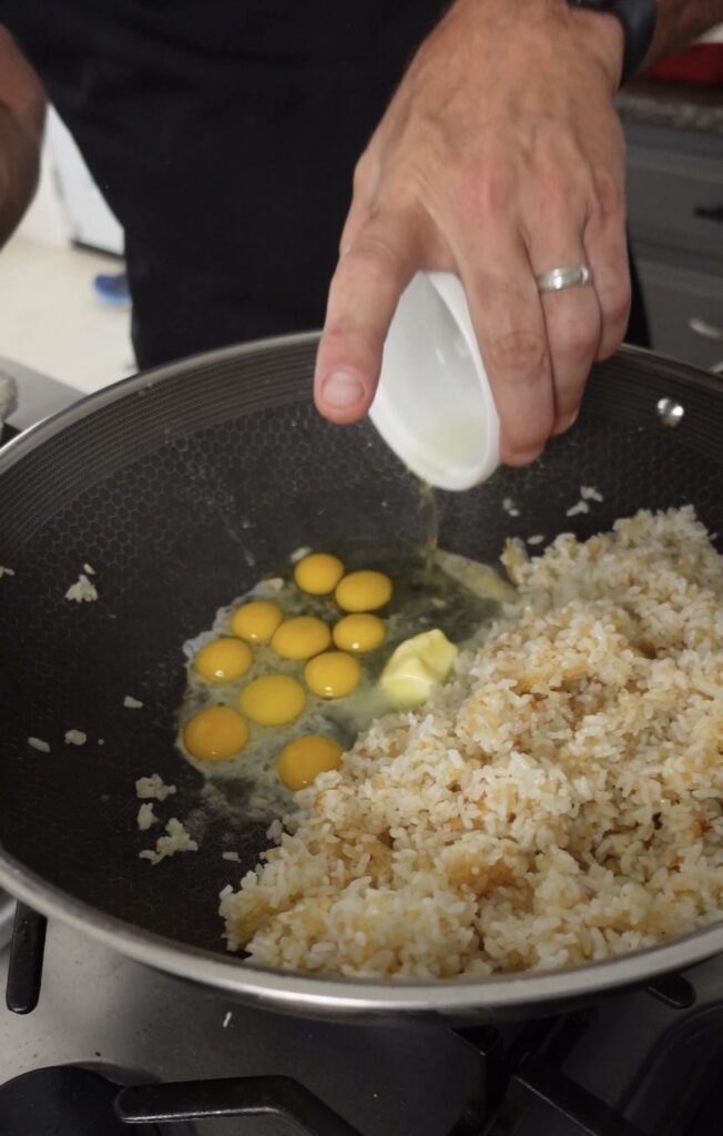 Eggs cooking in a wok.