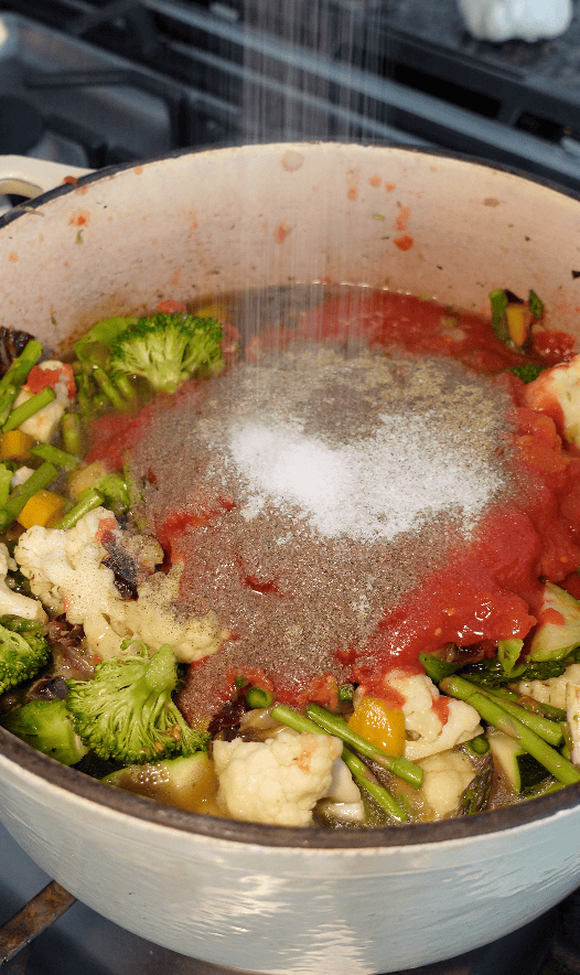 Salt and Pepper going into soup.