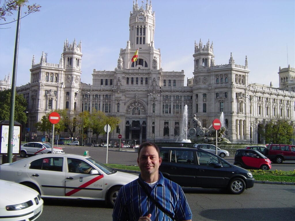 Tim in front of a castle.