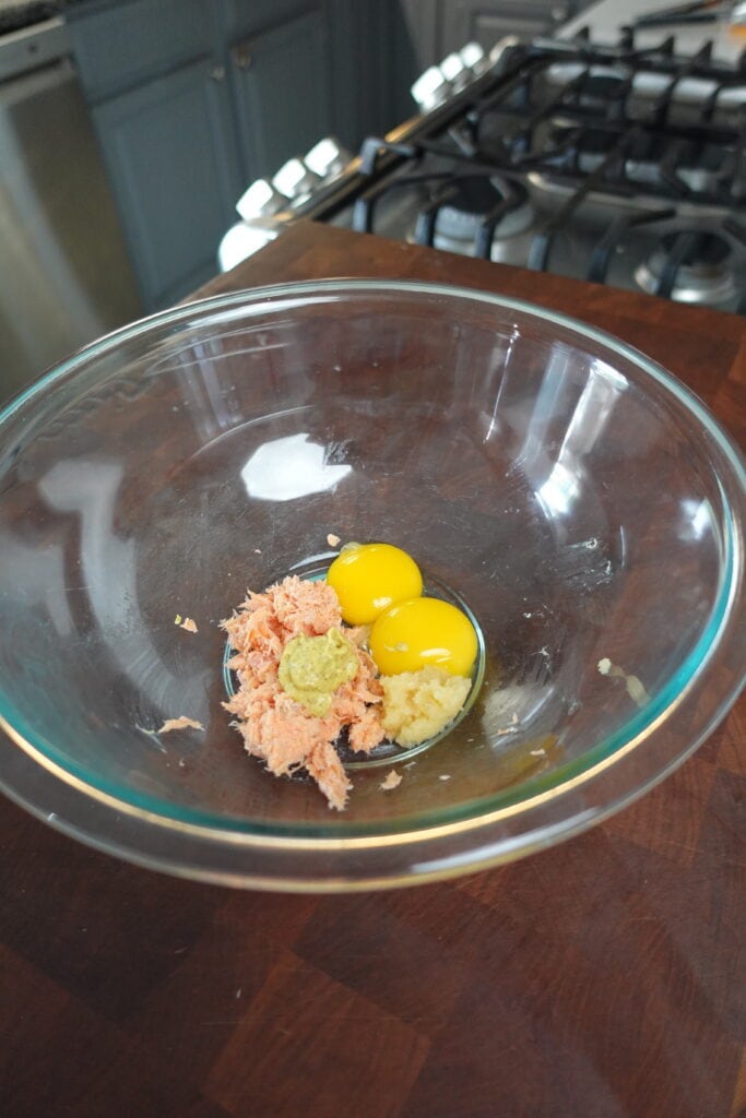 fish with eggs and dressing ingredients.