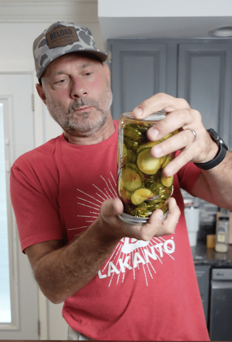 Shaking up Cucumbers in a jar.