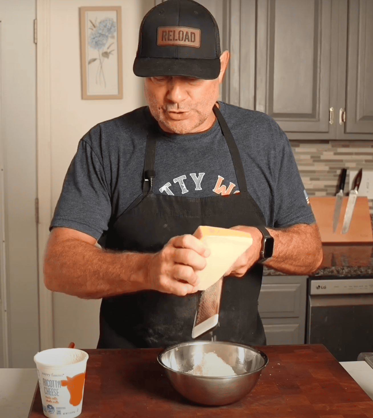 Shredding parmesan into a bowl.