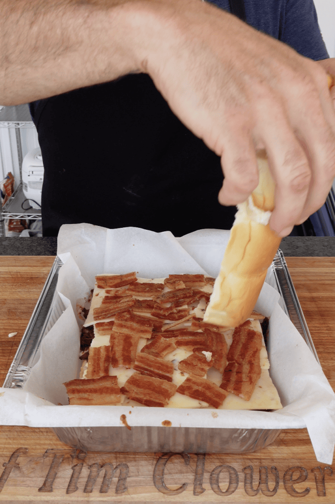 Bacon and cheese on a slider.