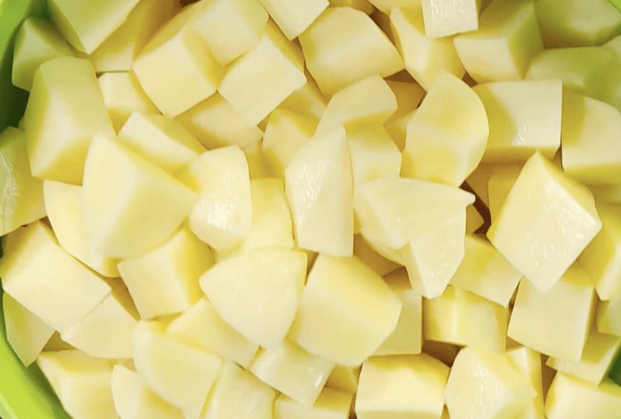 A pile of diced potatoes.