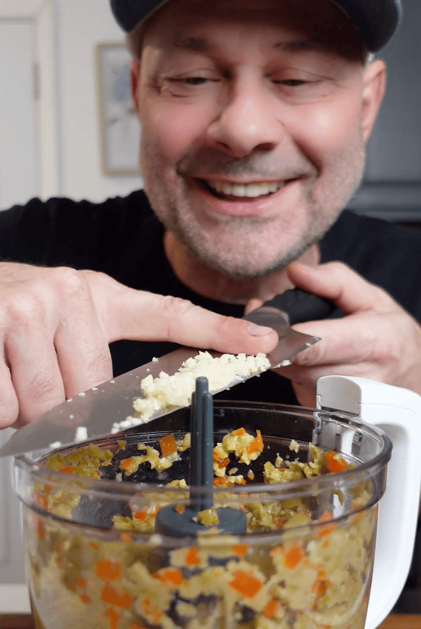 Garlic going into food processor.