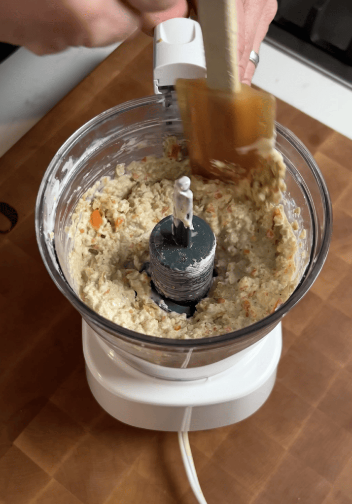 A spatula scooping up Olive Dip.