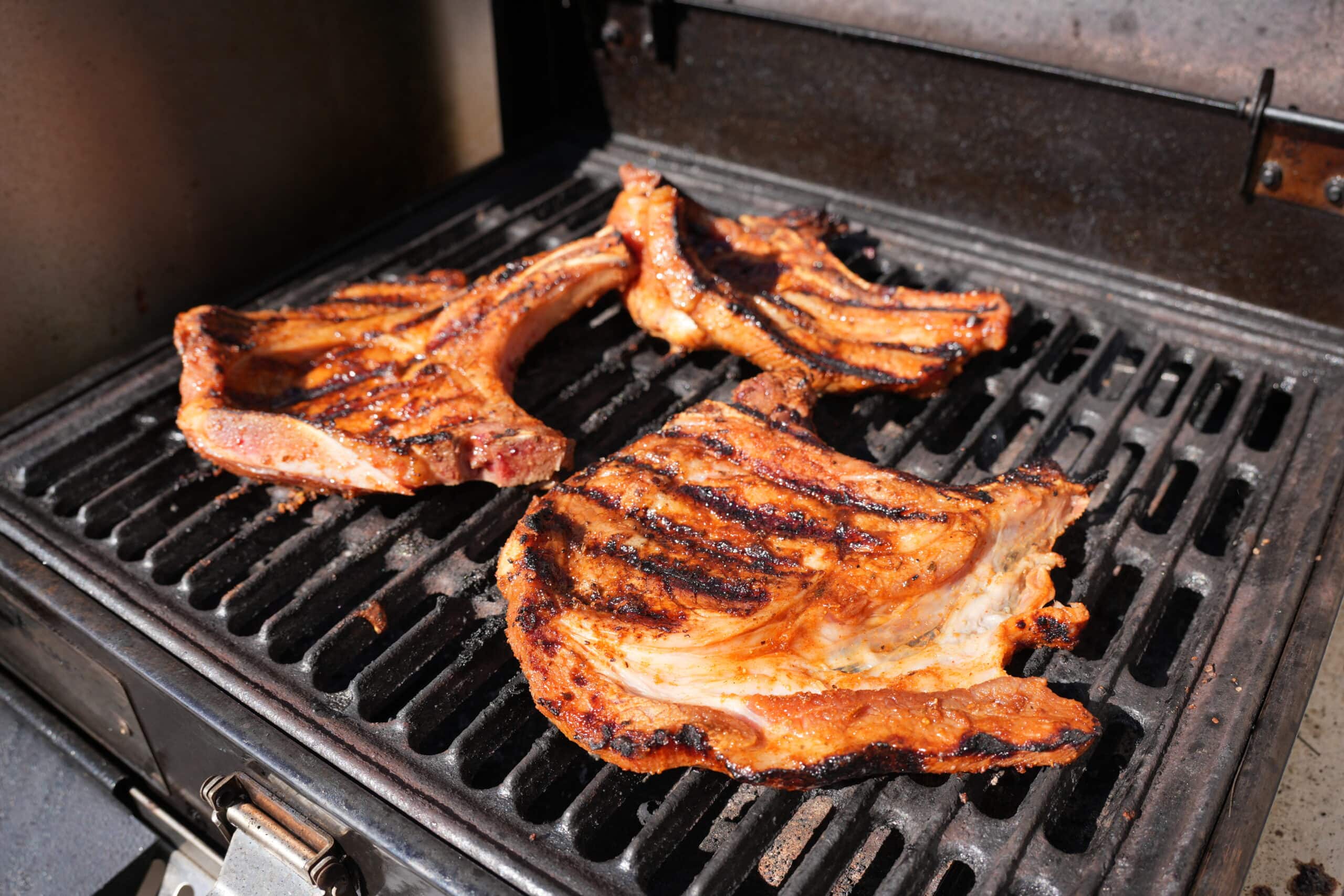 Bone In pork chops on the grill.
