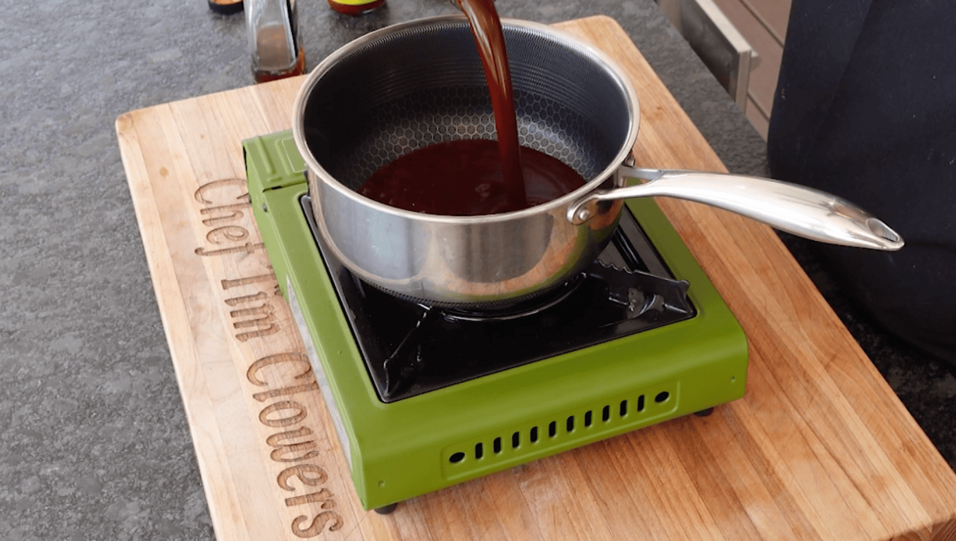 BBQ Sauce going into a pot.