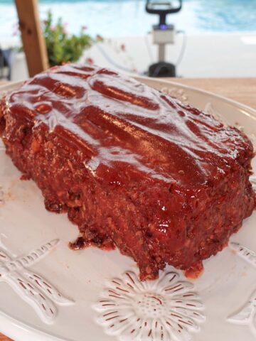 Meatloaf on a white plate.