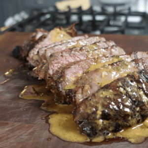 Cowboy Butter over sliced steak.