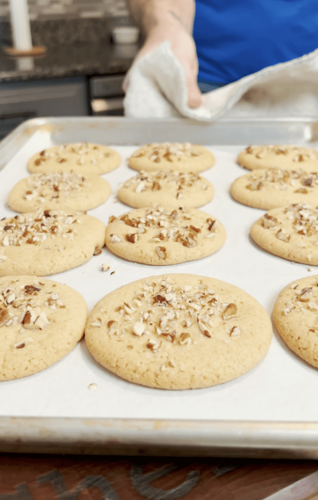 Baked cookies on a cookie sheet.