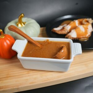 A bowl of turkey gravy.