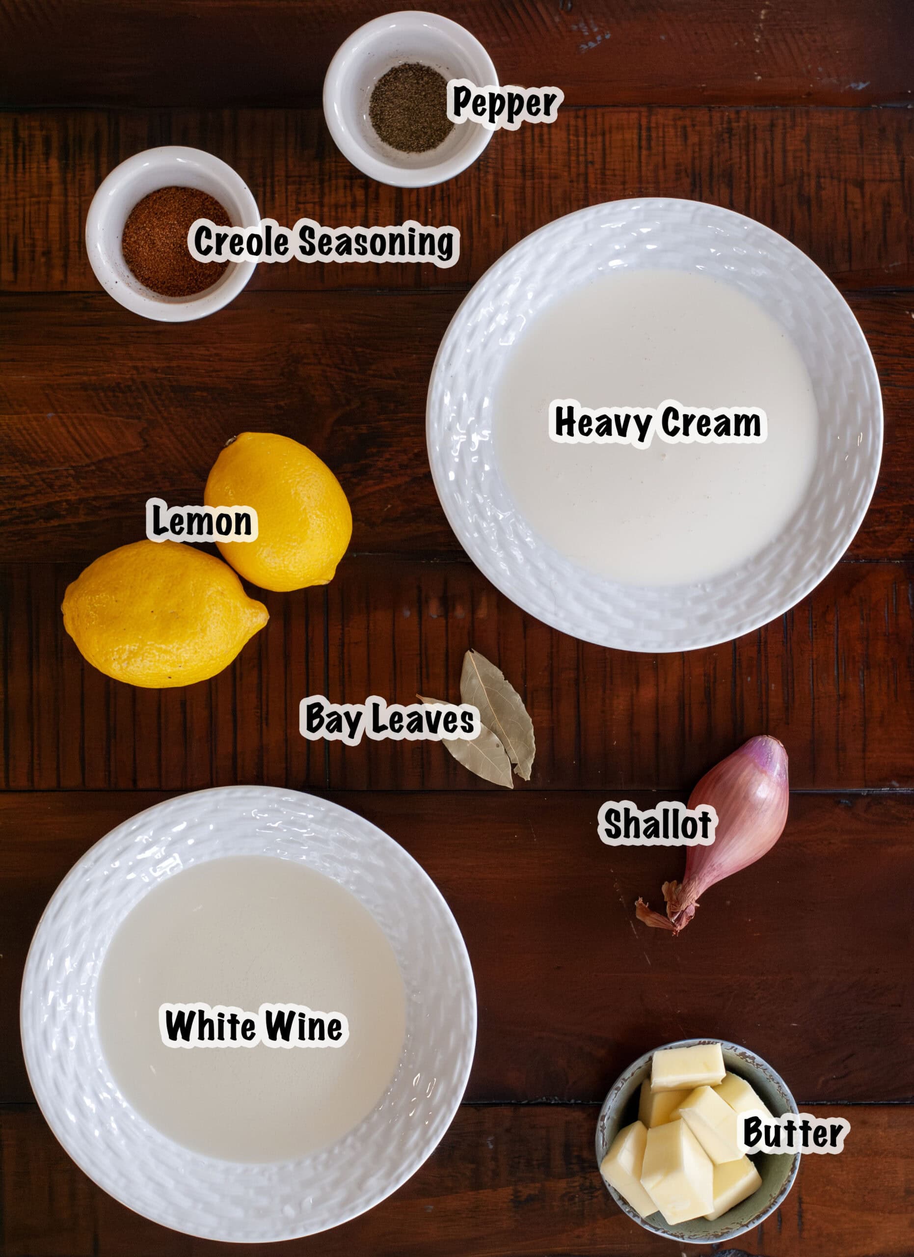 Measured out ingredients for a beurre blanc sauce.