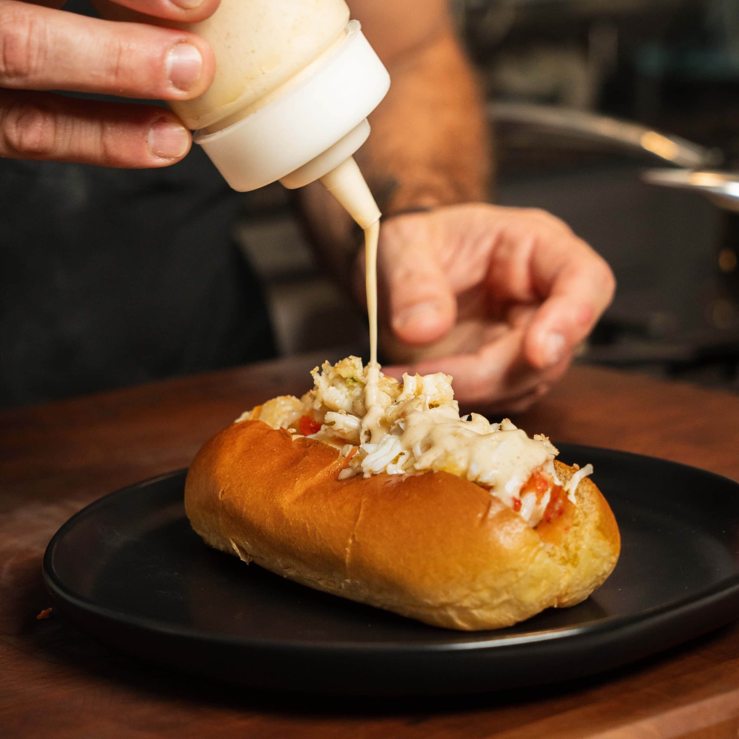 Cajun Beurre Blanc over a lobster dog.