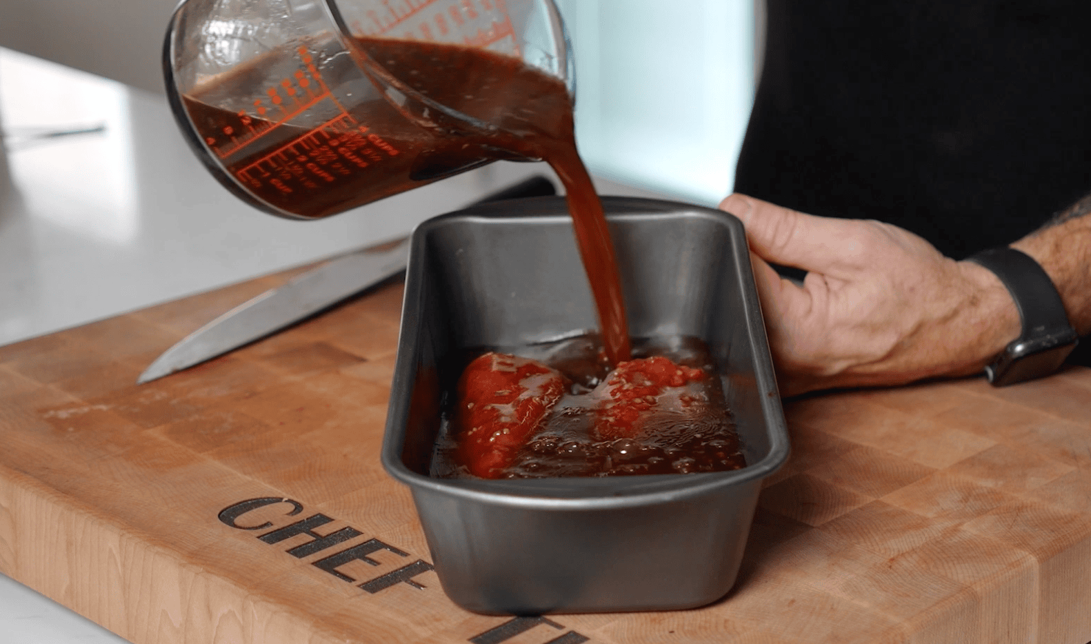 Venison backstrap in a marinade.