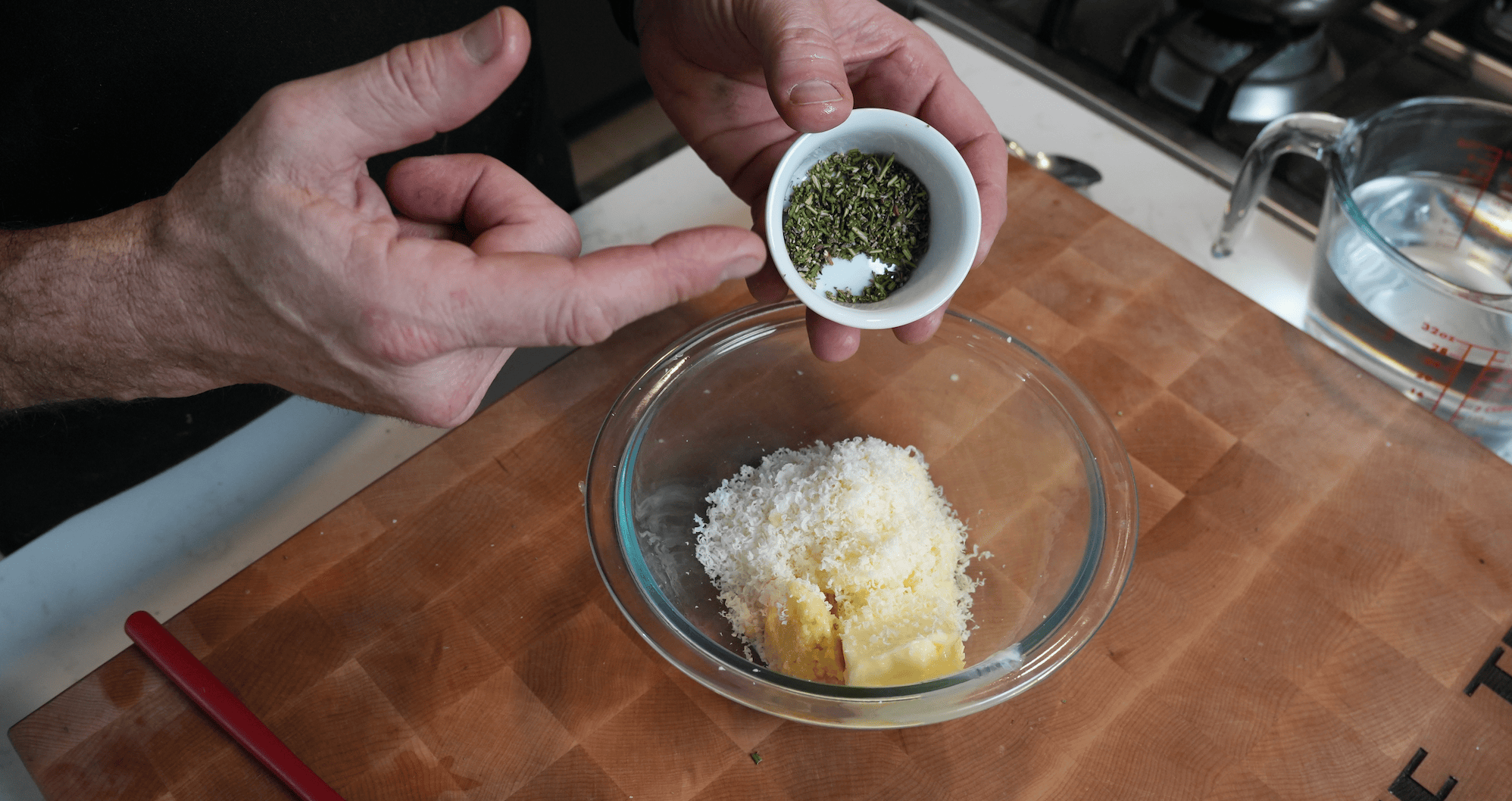 Rosemary parmesan butter in a bowl.