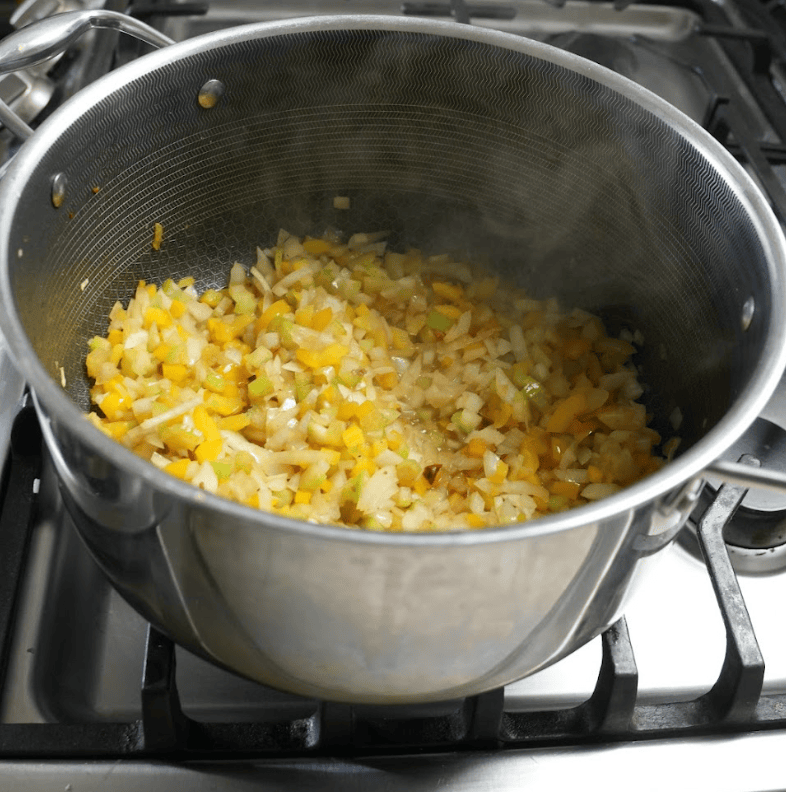 Sauteed onions in a pot.