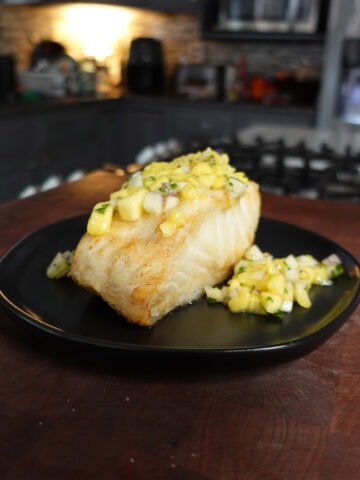 Sea bass topped with mango salsa.