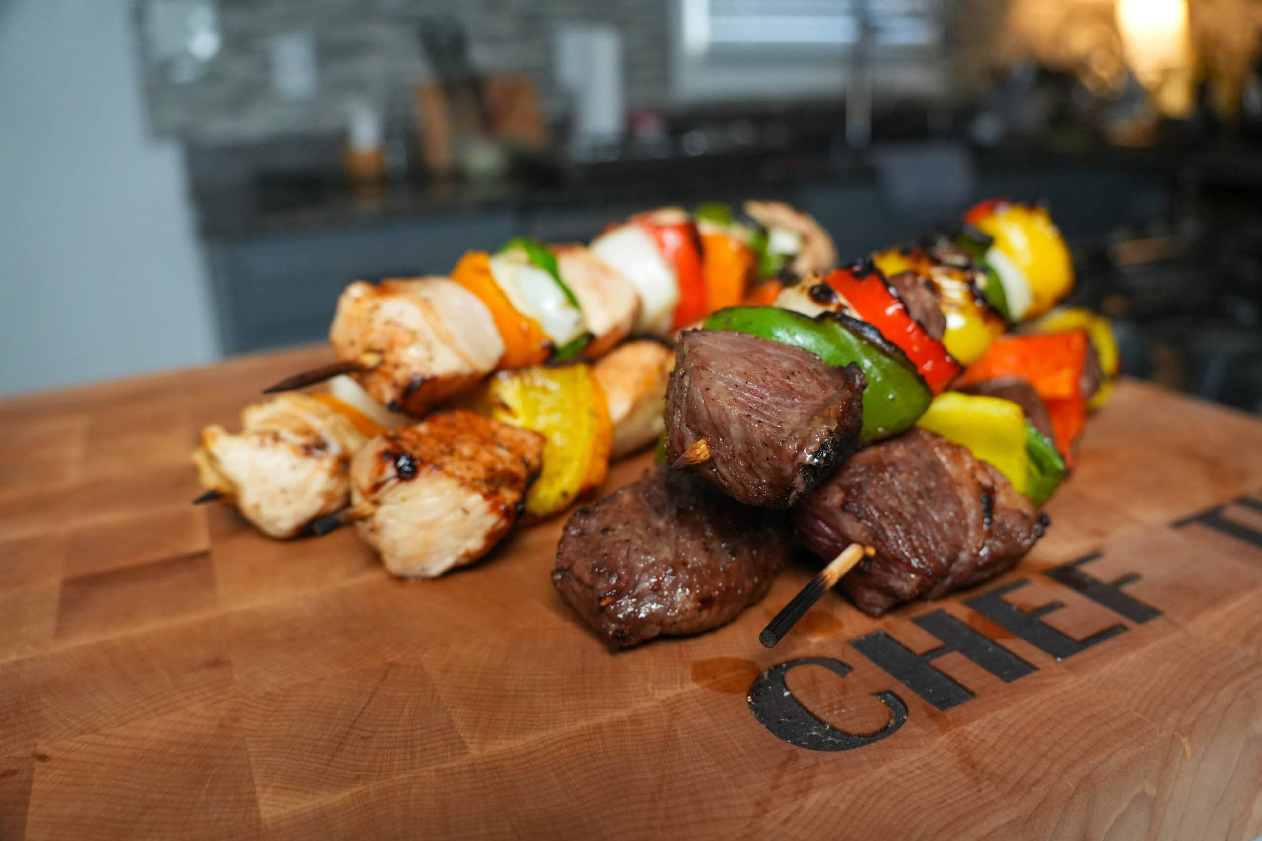 Steak and chicken skewers with peppers.