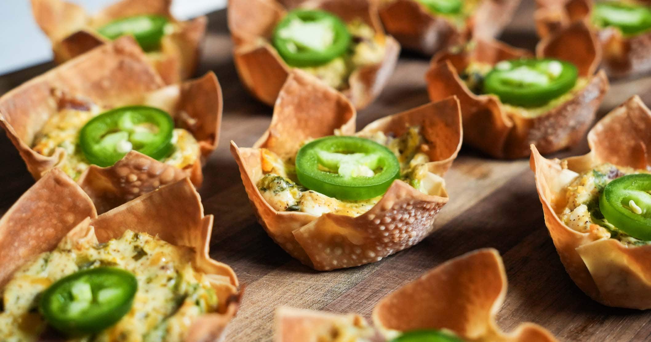 Jalapeno wontons topped with a jalapeño.