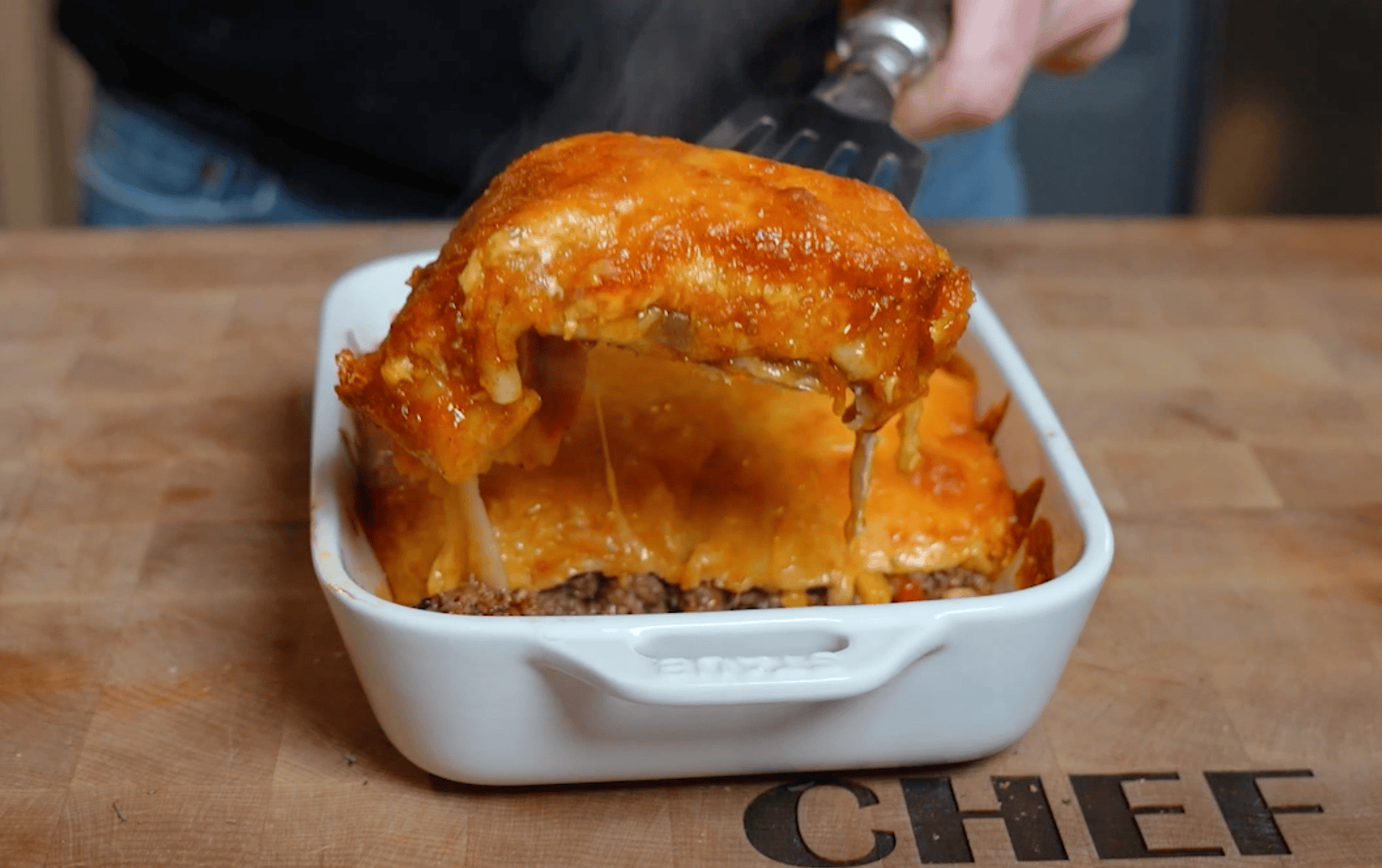 Beef enchiladas in a baking dish.