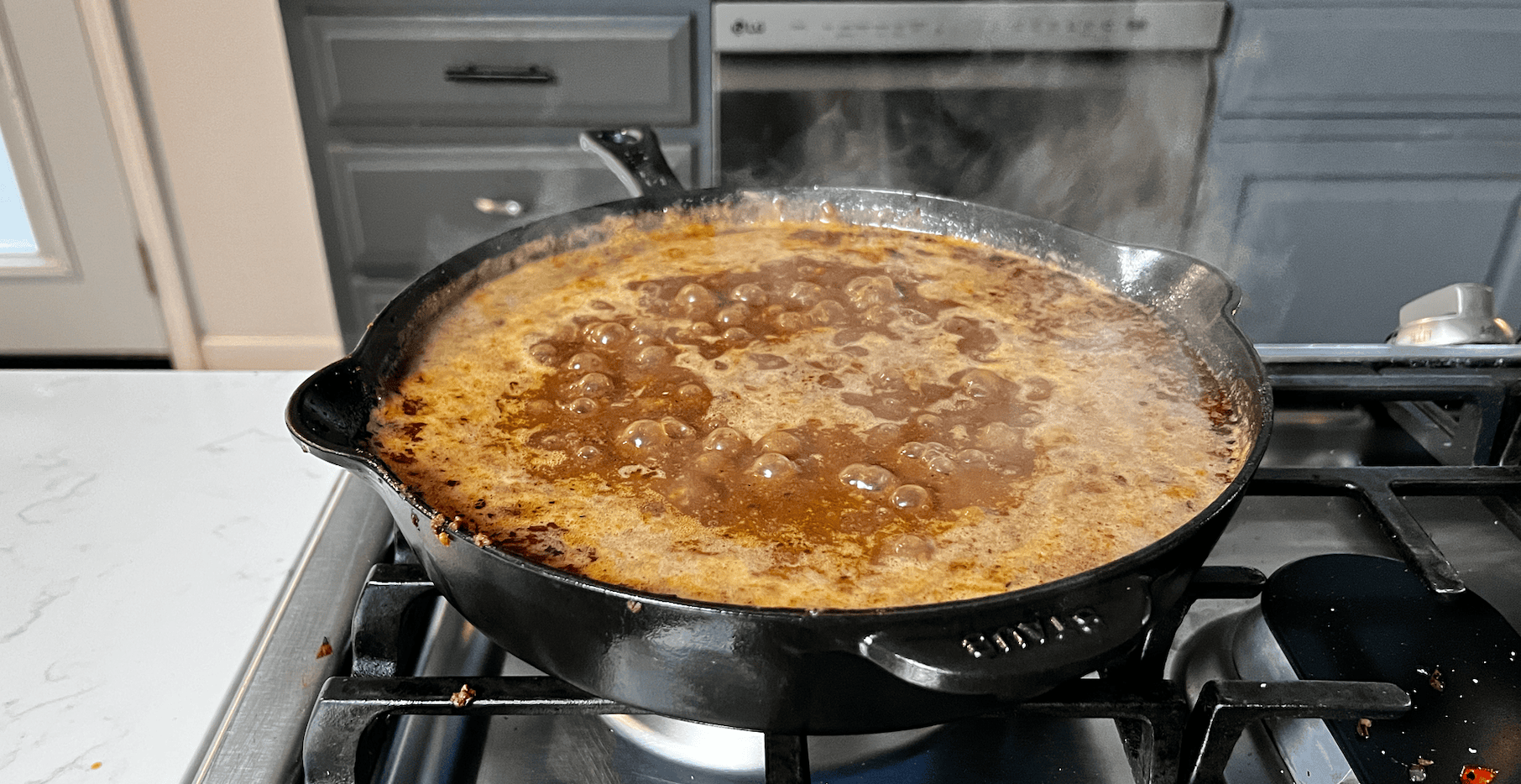 Boiling ingredients in a skillet.