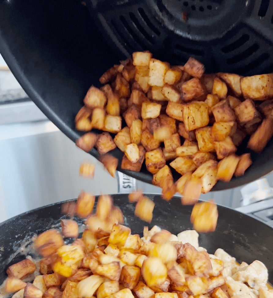 Potatoes coming out of air fryer.