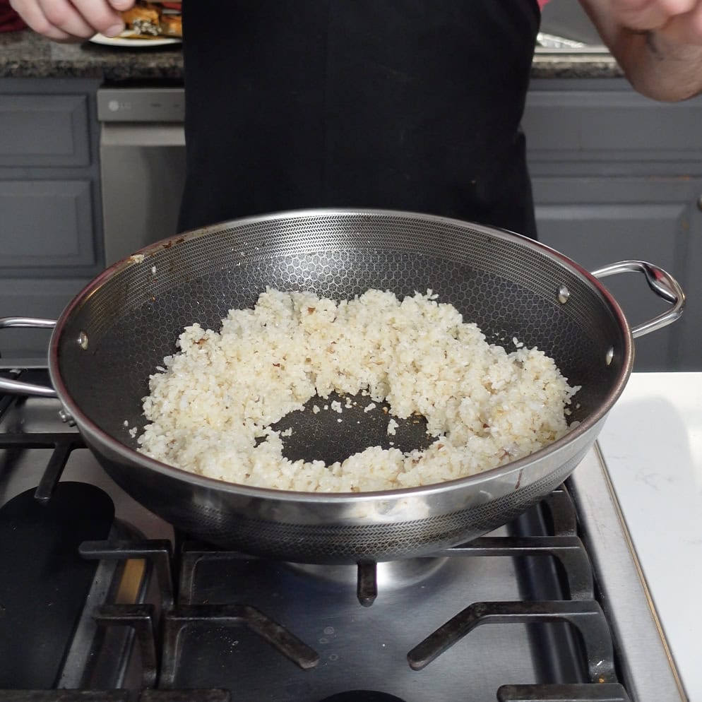 Rice cooking in a wok.