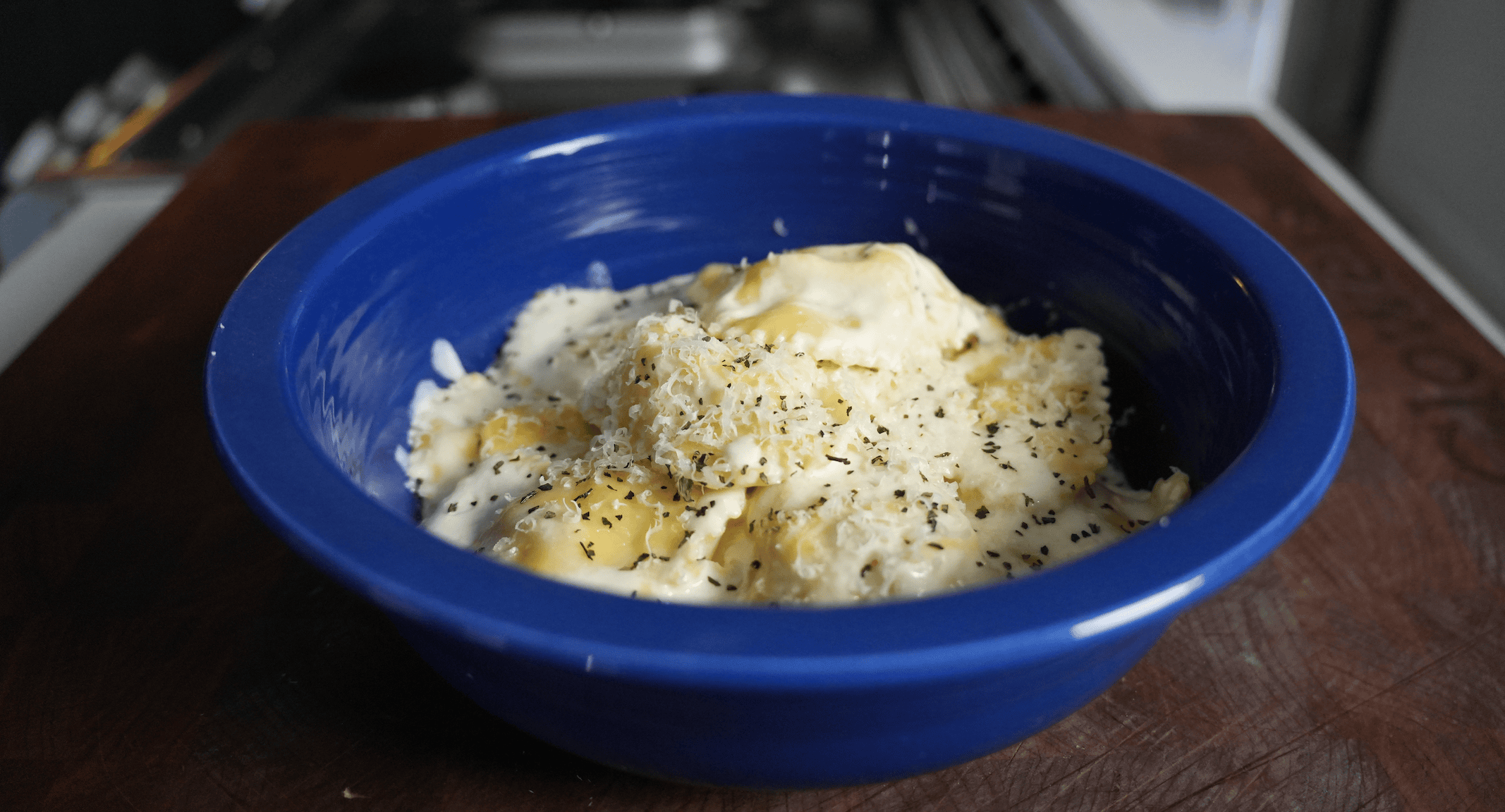 Lobster ravioli topped with parmesan cheese.