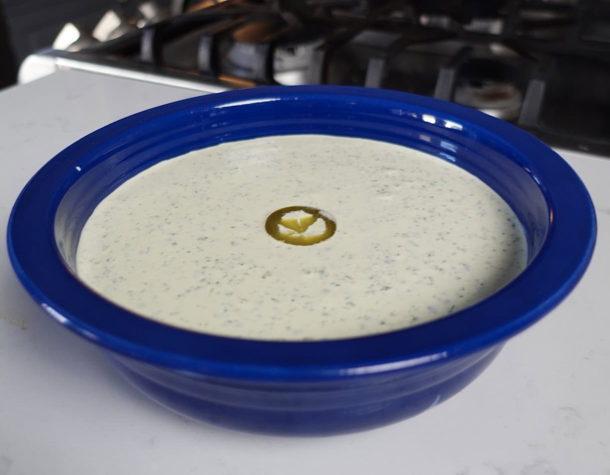 Jalapeño Ranch Crack Dip in a blue bowl.