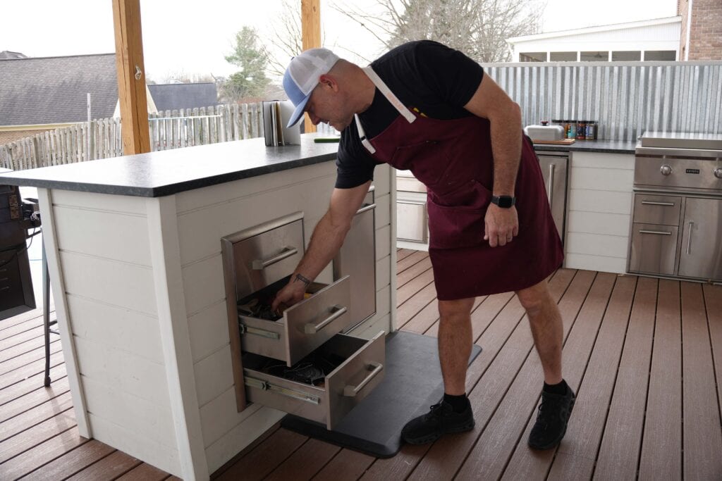 RTA outdoor island with drawers opening.