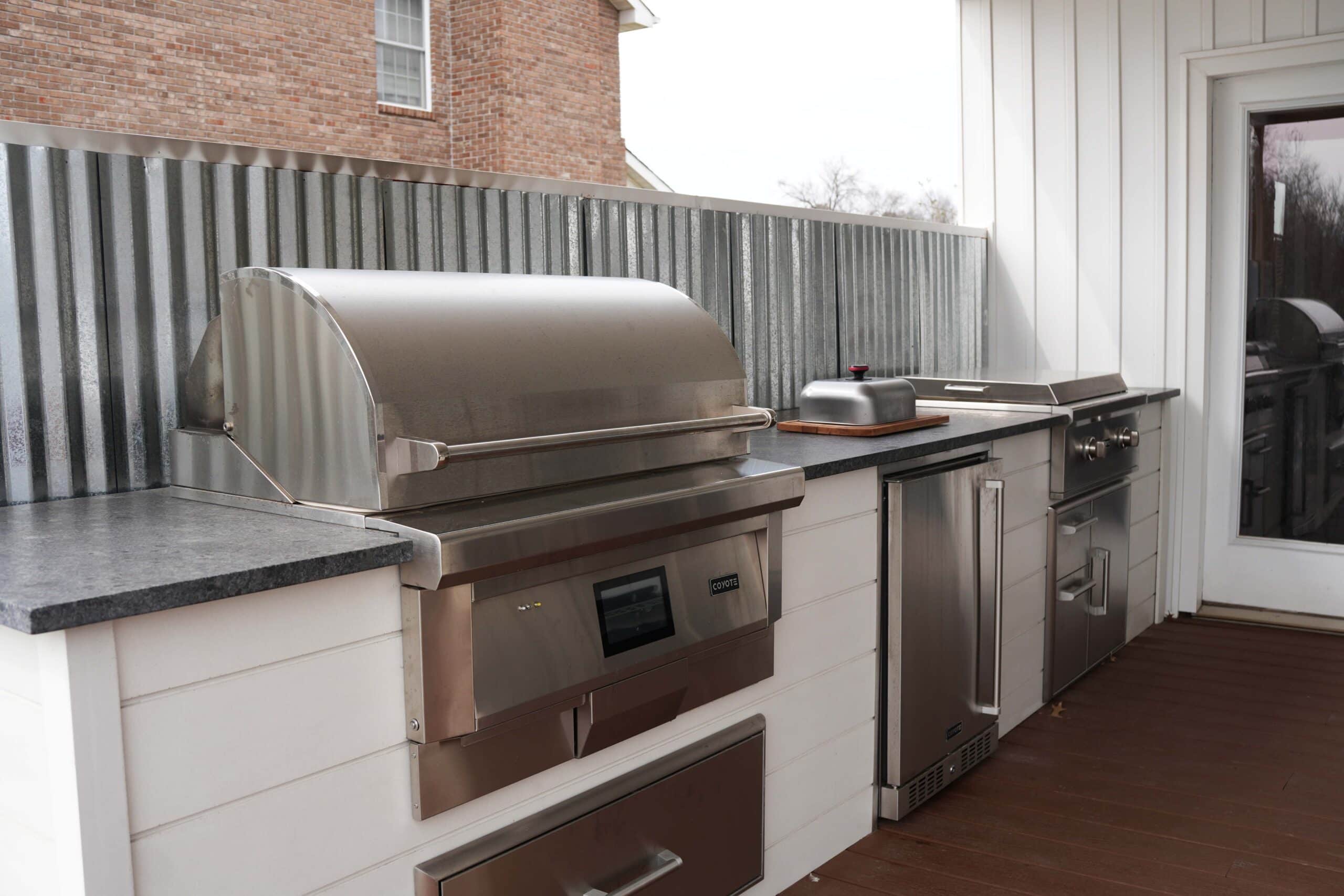 RTA Outdoor setup with smoker, fridge and griddle.